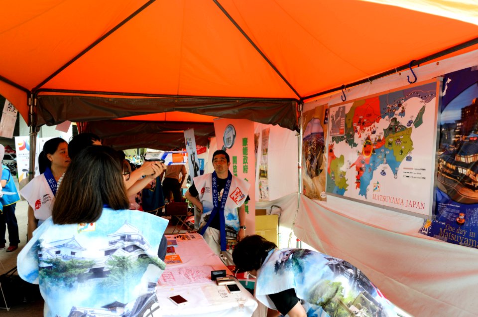 Visitor Playing Shooting Game in Matsuyama city Booth for Gift 20170530