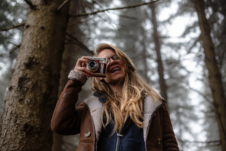 Female photographer camera