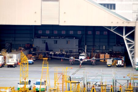 CAA MOTC Beechcraft Super King B350iER B-00101 and d Roc Aviation Britten Norman BN-2B-20 Islander B-68802 in Hamgar of Taipei Songsham Airport 20151107