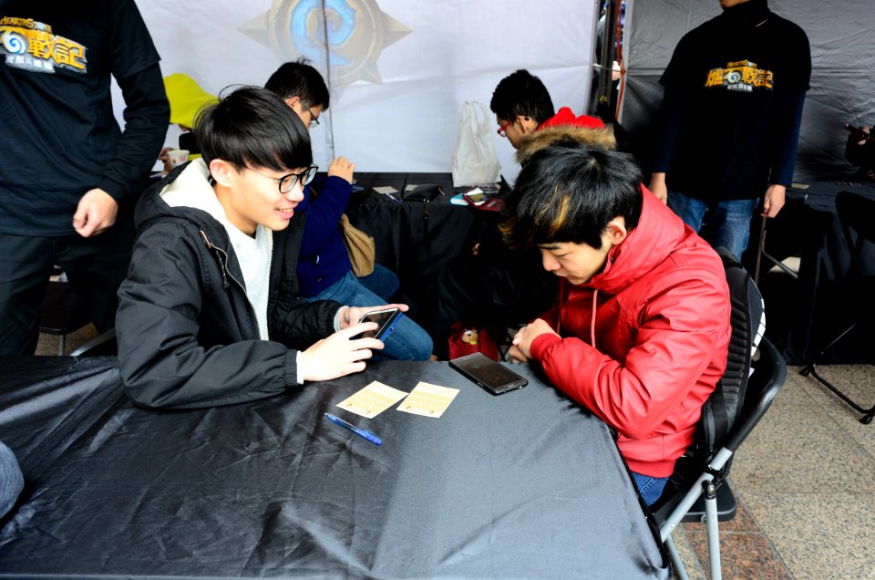 Adventurers Playing Hearthstone in Arena Tent 20170211a