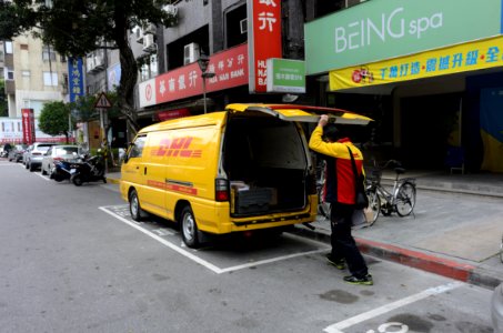 DHL Driver Closing Rear Door of Van after Take Items 20170202