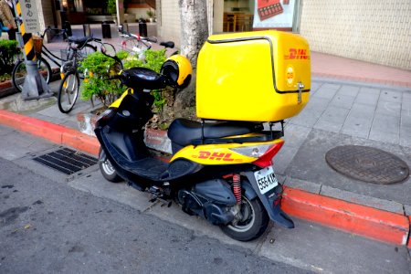DHL Kymco Scooter Parked at Section 5, Minsheng East Road, Taipei 20141230