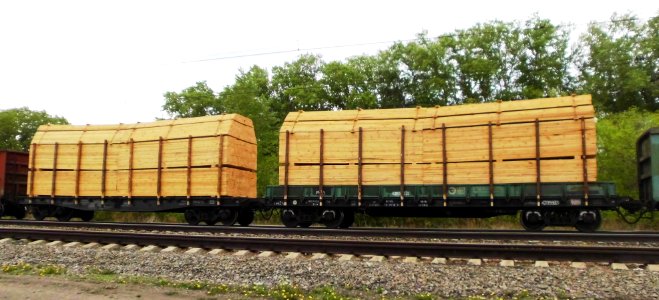 Timber flat railway wagons