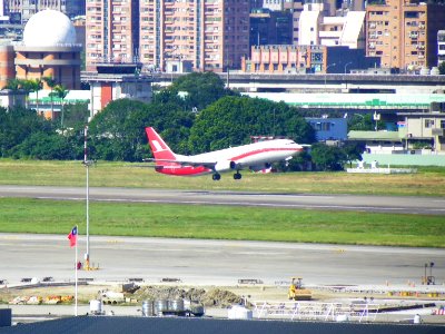 Shanghai Airlines B-2168 Taking off from Taipei Songshan Airport 20121220