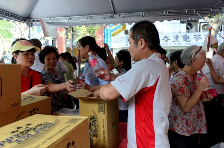 Staff Sending Bottled Water to Neighbors after Ghost Festival 20150822