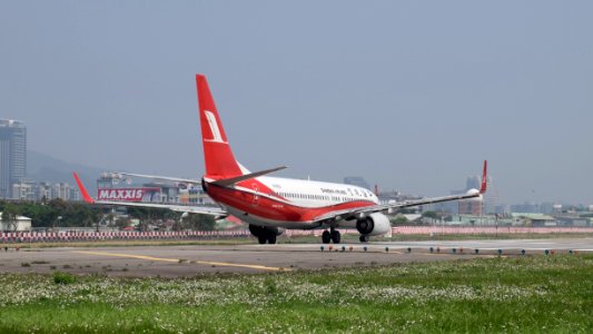 Shanghai Airlines Boeing 737-86D B-5832 Taking off from Taipei Songshan Airport 20150314
