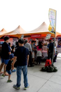 Visitors in Front of Matsuyama city Booth Waiting for Play Shooting Game 20170530a