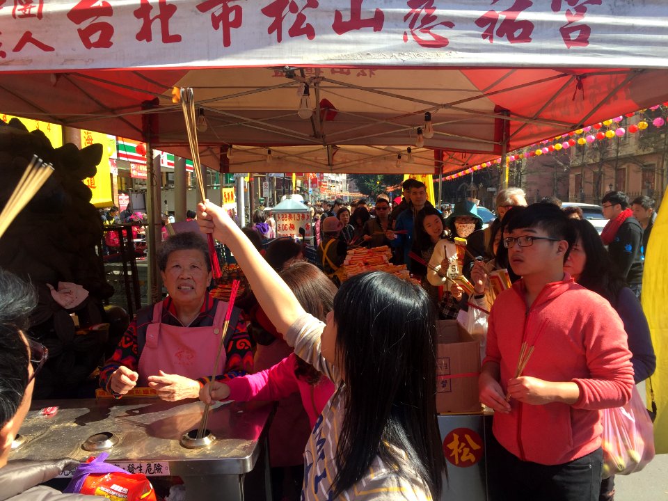 Visitors Receving Jossy Sticks and Jossy Paper in Front of Songshan Ciyou Temple 20160208