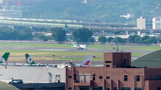 UNI Air ATR 72-600 B-17010 Taking off from Taipei Songshan Airport 20141002