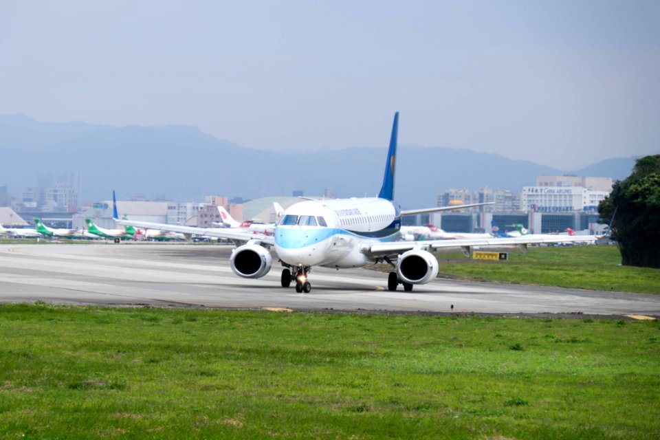 Mandarin Airlines Embraer ERJ 190 B-16825 Departing from Taipei Songshan Airport 20150101a