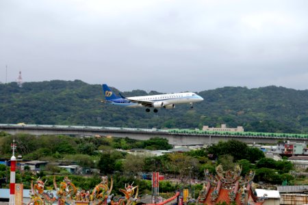 Mandarin Airlines Embraer ERJ 190 B-16825 on Final Approach at Taipei Songshan Airport 20150321a