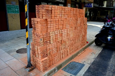 Red Bricks Stack on Sidewalk of Lane 212, Section 5, Minsheng East Road, Taipei 20160829 photo
