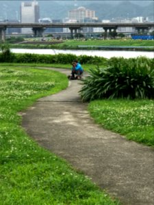 Photographer Photographing Runners in Guanshan Riverside Park 20170423