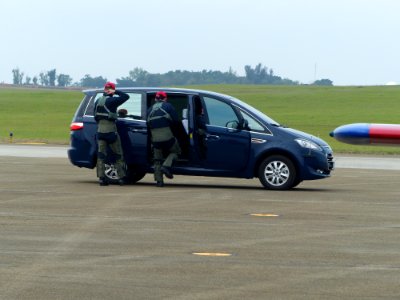 Pilots of ROCAF Thundertigers Taking Luxgen 7 MPV Leave Apron 20161126