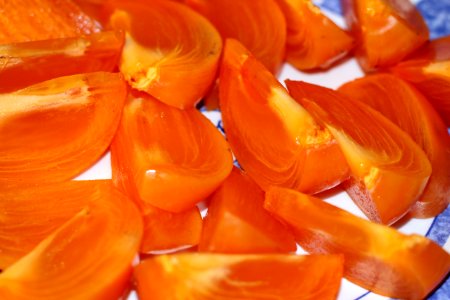 Persimon or Sharon served on a plate