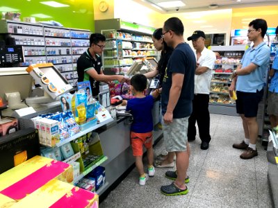 People Buying Food in FamilyMart Jingji Store 20170708