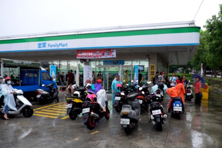 People at FamilyMart Wuri Chengling Store Waiting Rain Stop 20150606 photo