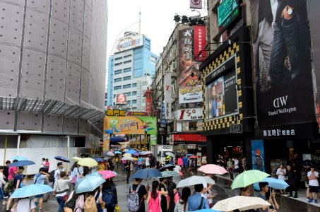 People with Umbrellas Walking into Hanzhong Street, Taipei 20160610