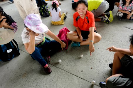 People Standing Eggs on Park Ground 20170530b