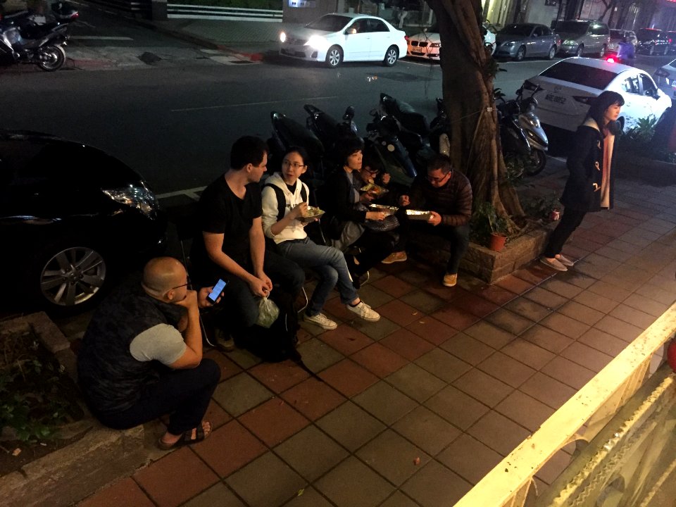 People eating Dishes at Sidewalk of Yanshou Street, Songshan District, Taipei 20170323