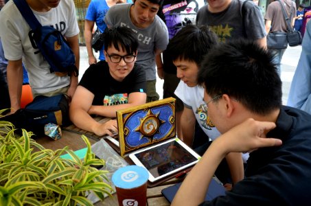 People Playing Hearthstone in ATT 4 FUN Plaza 20160430d photo