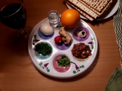 Passover Seder plate with wine and matzot