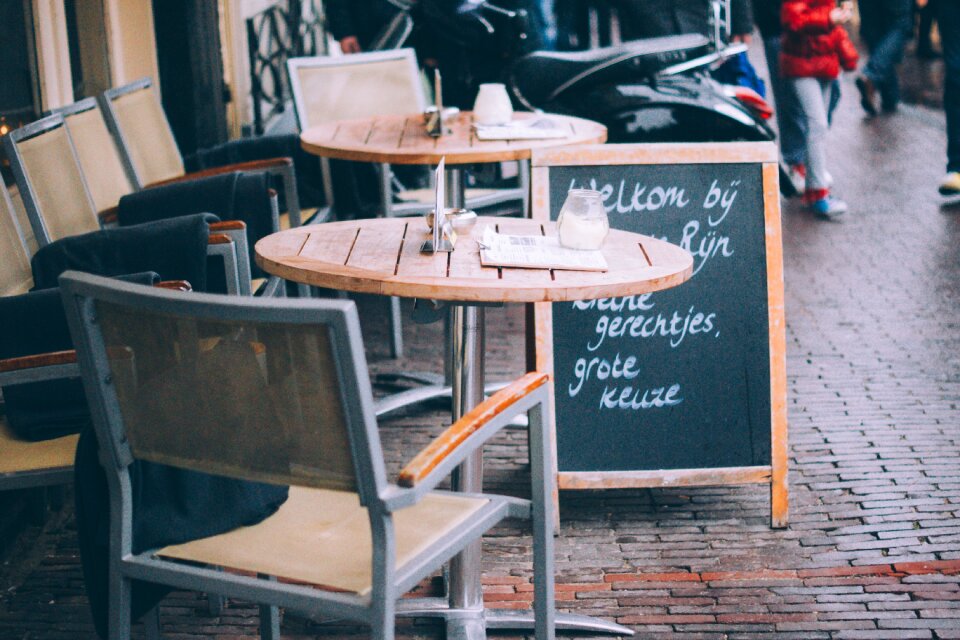 Chairs sidewalk cobblestone photo