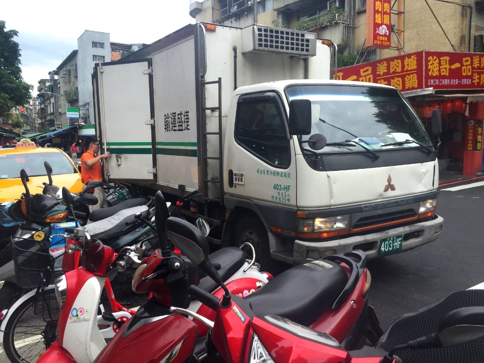 President Logistics International Driver Checking Truck Cargo before Leave 20160908