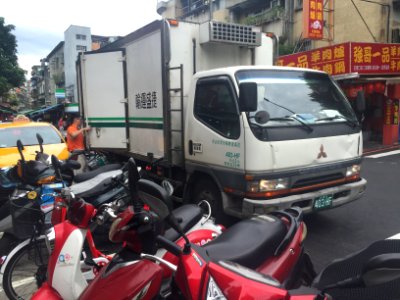 President Logistics International Driver Checking Truck Cargo before Leave 20160908