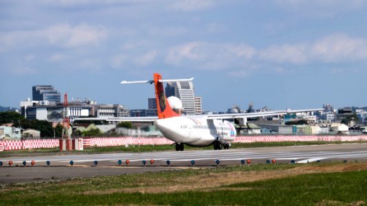 Transasia Airways ATR 72-212A B-22807 Taking off from Taipei Songshan Airport 20150103