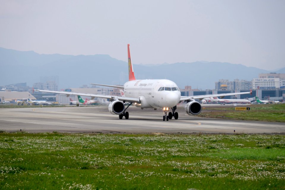TransAsia Airways Airbus A320-200 B-22311 Departing from Taipei Songshan Airport 20150221b