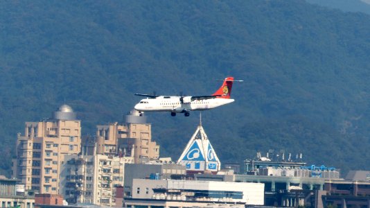 Transasia Airways ATR 72-212A B-22807 on Final Approach at Taipei Songshan Airport 20150104a