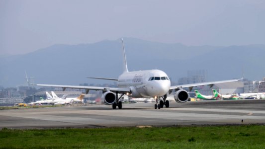 TransAsia Airways Airbus A321-231 B-22610 Departing from Taipei Songshan Airport 20150101b