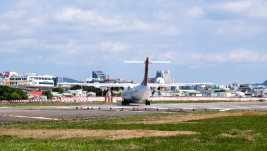 Transasia Airways ATR 72-212A B-22807 Turning Head at Taipei Songshan Airport Runway 20150103