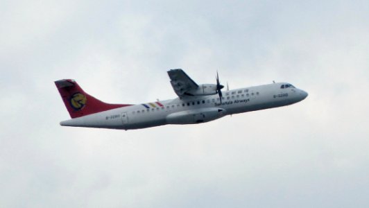 TransAsia Airways ATR 72-212A B-22810 Taking off from Taipei Songshan Airport 20140718b