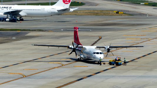 TransAsia Airways ATR 72-212A B-22823 Back up by Tractor at Taipei Songshan Airport 20160924d