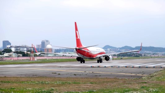 Shanghai Airlines Boeing 737-86D B-5395 Taking off from Taipei Songshan Airport 20150110