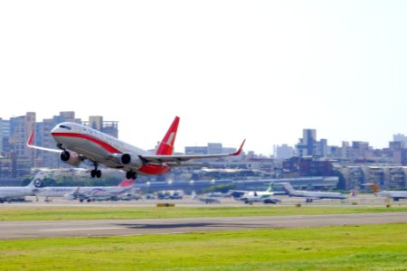 Shanghai Airlines Boeing 737-89P (WL) B-6993 Taking off from Taipei Songshan Airport 20161217