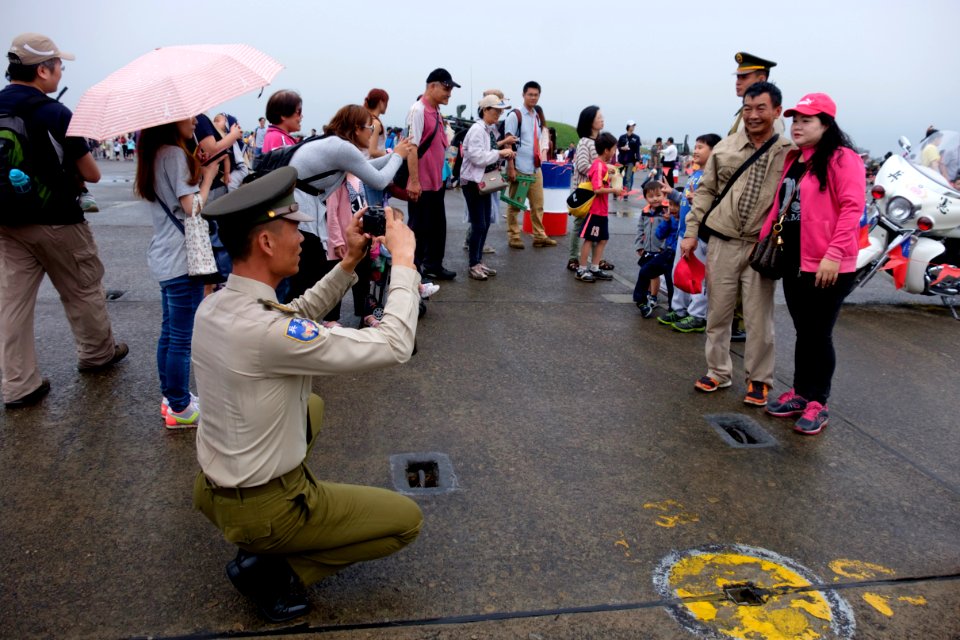 ROCMP Master Sergeant Photographing Visitors with Patrol Motorcycle in Hsinchu AFB 20151121