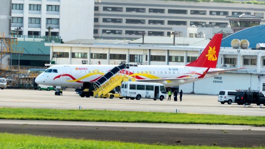 Sparkle Roll Jet Embraer 190-100 B-3219 Parked at Taipei Songshan Airport Apron 20161124