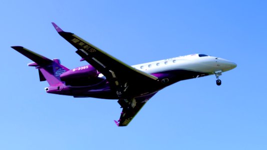 Sparkle Roll Jet Embraer Legacy 500 B-3385 on Final Approaching at Taipei Songshan Airport 20160924b