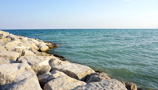 Rock water clouds photo