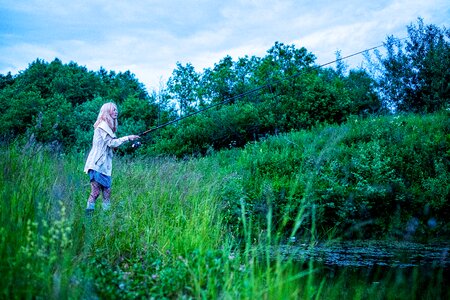 Fishing rods pond summer photo