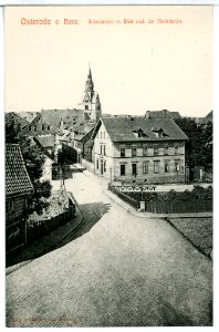 09259-Osterode-Harz-1907-Johannistor mit Blick auf die Marktkirche-Brück & Sohn Kunstverlag