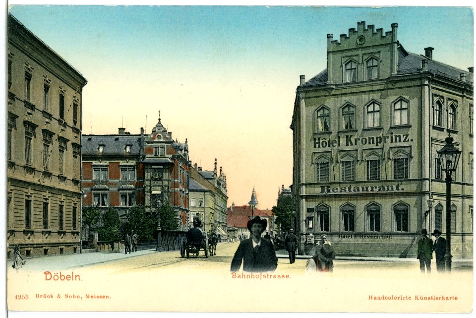 04953-Döbeln-1903-Bahnhofstraße mit Hotel Kronprinz und Pferdewagen-Brück & Sohn Kunstverlag