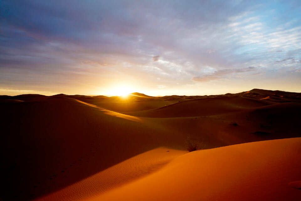 Dunes sun sky photo