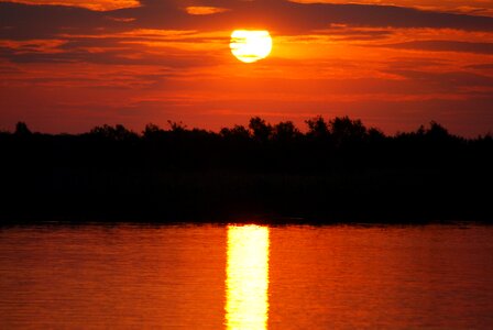 Dawn lake sun photo