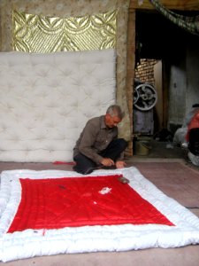 Quilter and quilting in the Bazaar of Nishapur 12
