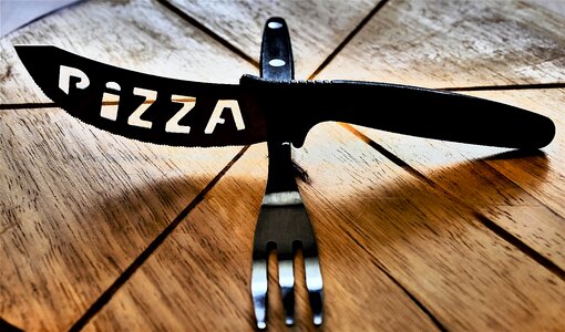 Cutlery pizza cutlery artistically photo