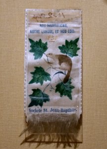 Rosette of the Societe Saint-Jean-Baptiste, 1850, silk - Château Ramezay - Montreal, Canada - DSC07530